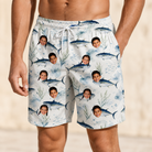Model wearing Men's Castaway Catch Custom Face Beach Shorts printed with kids' faces