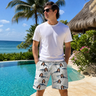 Real-life photo of someone wearing Men's Castaway Catch Custom Face Beach Shorts — custom faces printed all-over