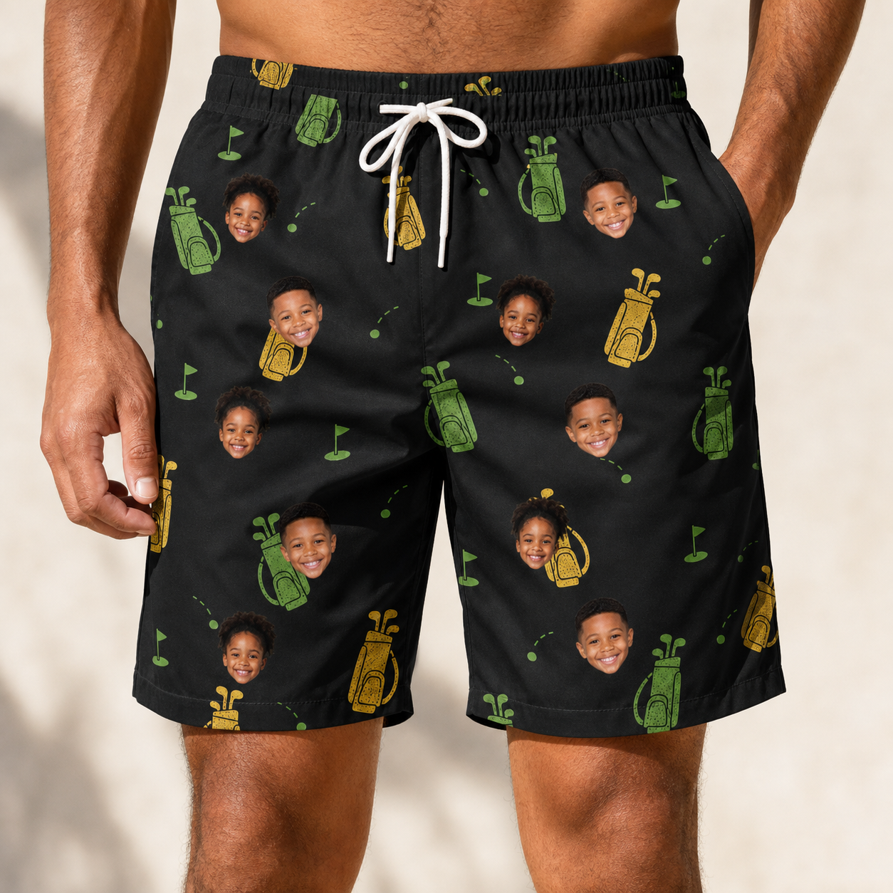 Model wearing Men's Divot Duffels Custom Face Beach Shorts printed with kids' faces