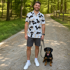 Full-length photo with the pet printed all over this Men's Biscuit Bark Custom Dog Face Polo Shirt