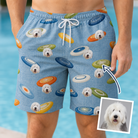 Man wearing Men's Aero Barkers Custom Dog Face Beach Shorts — custom faces printed all-over