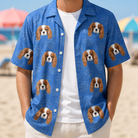 Man wearing Men's Kibble Cartography Custom Dog Face Hawaiian Shirt open over a white tee