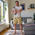 Full-length photo with the pet printed all over this Men's Mewton Balls Custom Cat Face Beach Shorts