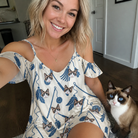 Selfie with the pet whose face is printed all over this Women's Catnip Kinetics Custom Cat Face Off-Shoulder Dress