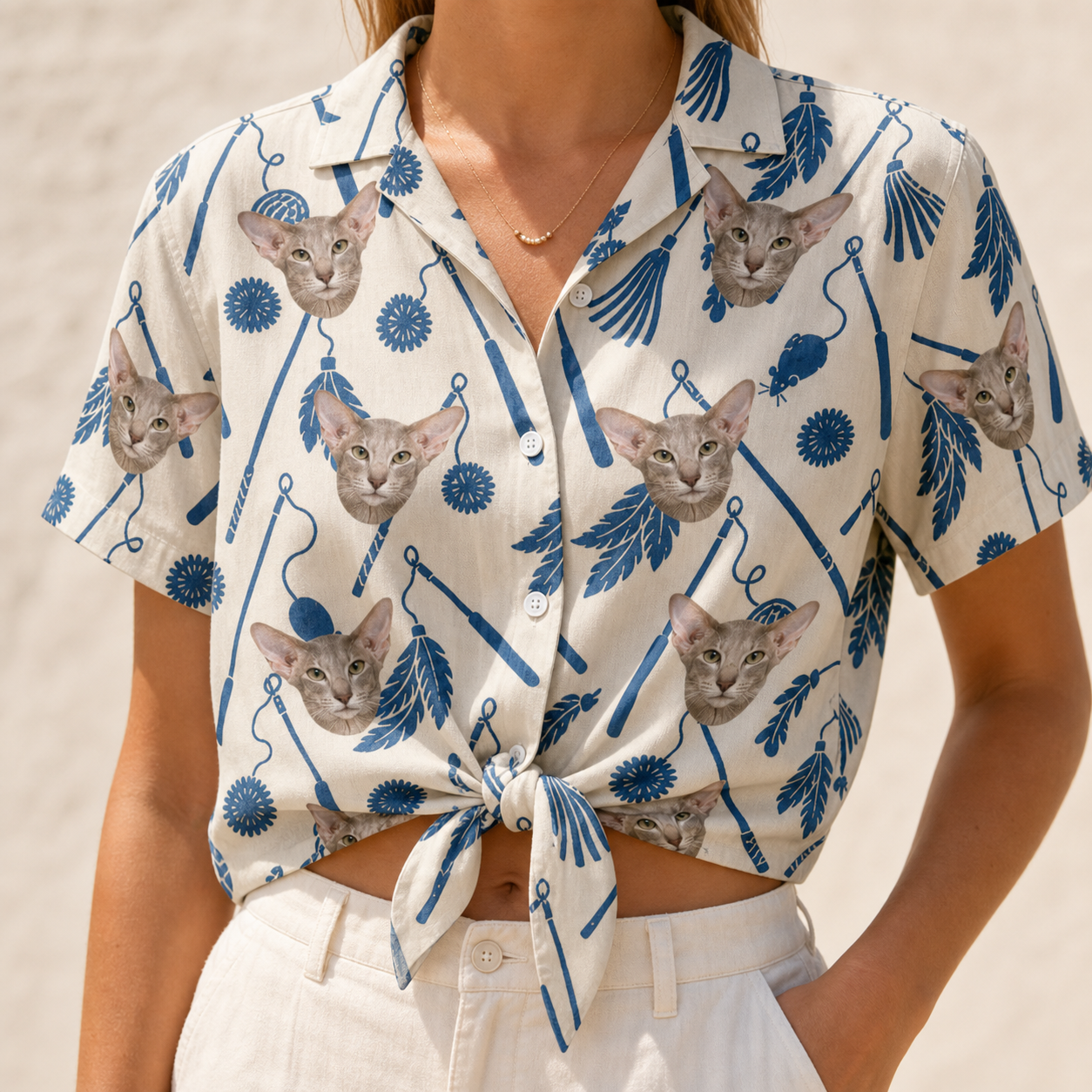 Woman wearing Women's Catnip Kinetics Custom Cat Face Hawaiian Shirt tied at the waist