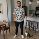Full-length photo with the pet printed all over this Men's Catnip Kinetics Custom Cat Face Polo Shirt