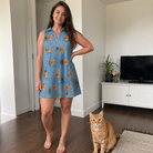 Full-length photo with the pet printed all over this Women's Scuttle Sideshow Custom Cat Face V-Neck Dress