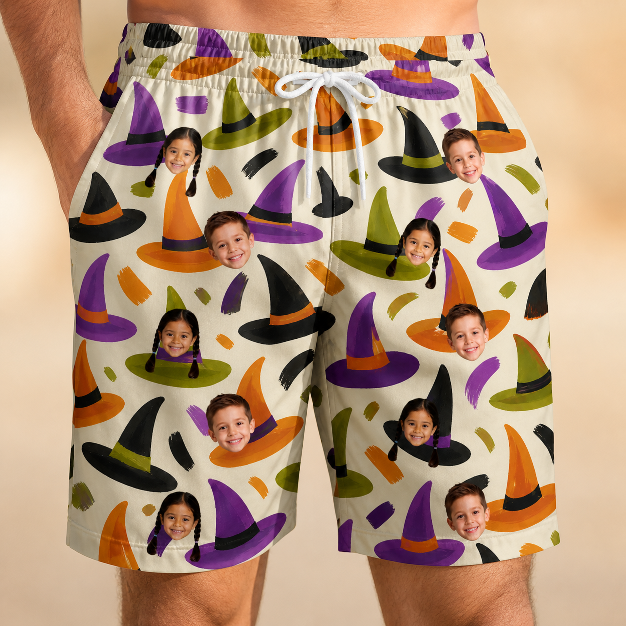 Model wearing Men's Samhain Silhouettes Custom Face Beach Shorts printed with kids' faces