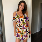 Real-life photo of someone wearing Women's Samhain Silhouettes Custom Face Off-Shoulder Dress — custom faces printed all-over