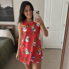 Real-life photo of someone wearing Women's Polar Pantomime Custom Face Tank Dress — custom faces printed all-over
