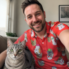 Selfie with the pet whose face is printed all over this Men's Polar Pantomime Custom Cat Face Polo Shirt