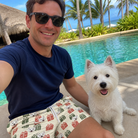 Selfie with the pet whose face is printed all over this Men's Bowtiful Bundles Custom Dog Face Beach Shorts