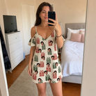 Real-life photo of someone wearing Women's Bowtiful Bundles Custom Face Off-Shoulder Dress — custom faces printed all-over