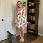 Full-length photo with the pet printed all over this Women's Bowtiful Bundles Custom Cat Face V-Neck Dress