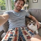 Selfie with the pet whose face is printed all over this Men's Christmas Cuffs Custom Cat Face Beach Shorts