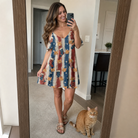 Full-length photo with the pet printed all over this Women's Christmas Cuffs Custom Cat Face Off-Shoulder Dress