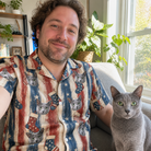 Selfie with the pet whose face is printed all over this Men's Christmas Cuffs Custom Cat Face Hawaiian Shirt