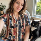 Selfie with the pet whose face is printed all over this Women's Christmas Cuffs Custom Cat Face Hawaiian Shirt