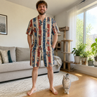 Full-length photo with the pet printed all over this Men's Christmas Cuffs Custom Cat Face Shirt & Shorts Set