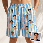 Man wearing Men's Mantel Munchkins Custom Face Beach Shorts — custom faces printed all-over