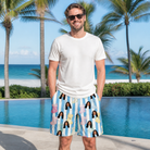 Real-life photo of someone wearing Men's Mantel Munchkins Custom Face Beach Shorts — custom faces printed all-over