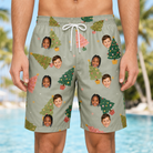 Model wearing Men's Trimmed Tannenbaums Custom Face Beach Shorts printed with kids' faces