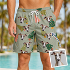 Man wearing Men's Trimmed Tannenbaums Custom Dog Face Beach Shorts — custom faces printed all-over