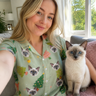 Selfie with the pet whose face is printed all over this Women's Trimmed Tannenbaums Custom Cat Face Hawaiian Shirt