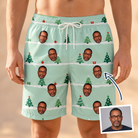 Man wearing Men's Evergreen Extravaganza Custom Face Beach Shorts — custom faces printed all-over