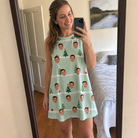 Real-life photo of someone wearing Women's Evergreen Extravaganza Custom Face Tank Dress — custom faces printed all-over