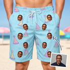 Man wearing Men's Hat Trickery Custom Face Beach Shorts — custom faces printed all-over
