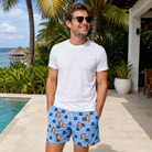 Real-life photo of someone wearing Men's Ganache Guffaws Custom Face Beach Shorts — custom faces printed all-over