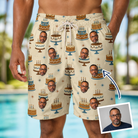 Man wearing Men's Frosting Fanfare Custom Face Beach Shorts — custom faces printed all-over
