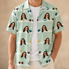 Man wearing Men's Lens Liaisons Custom Face Hawaiian Shirt open over a white tee