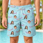 Model wearing Men's Festoon Fling Custom Face Beach Shorts printed with kids' faces