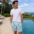 Real-life photo of someone wearing Men's Festoon Fling Custom Face Beach Shorts — custom faces printed all-over