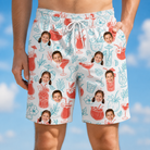 Model wearing Men's Engaged Elixirs Custom Face Beach Shorts printed with kids' faces