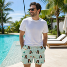 Real-life photo of someone wearing Men's Aisle Antics Custom Face Beach Shorts — custom faces printed all-over