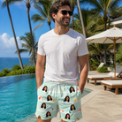 Real-life photo of someone wearing Men's Beach Ballad Custom Face Beach Shorts — custom faces printed all-over