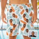 Man wearing Men's Spiky Staycation Custom Face Beach Shorts — custom faces printed all-over