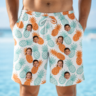 Model wearing Men's Spiky Staycation Custom Face Beach Shorts printed with kids' faces