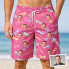 Man wearing Men's Sunbound Siblings Custom Face Beach Shorts — custom faces printed all-over