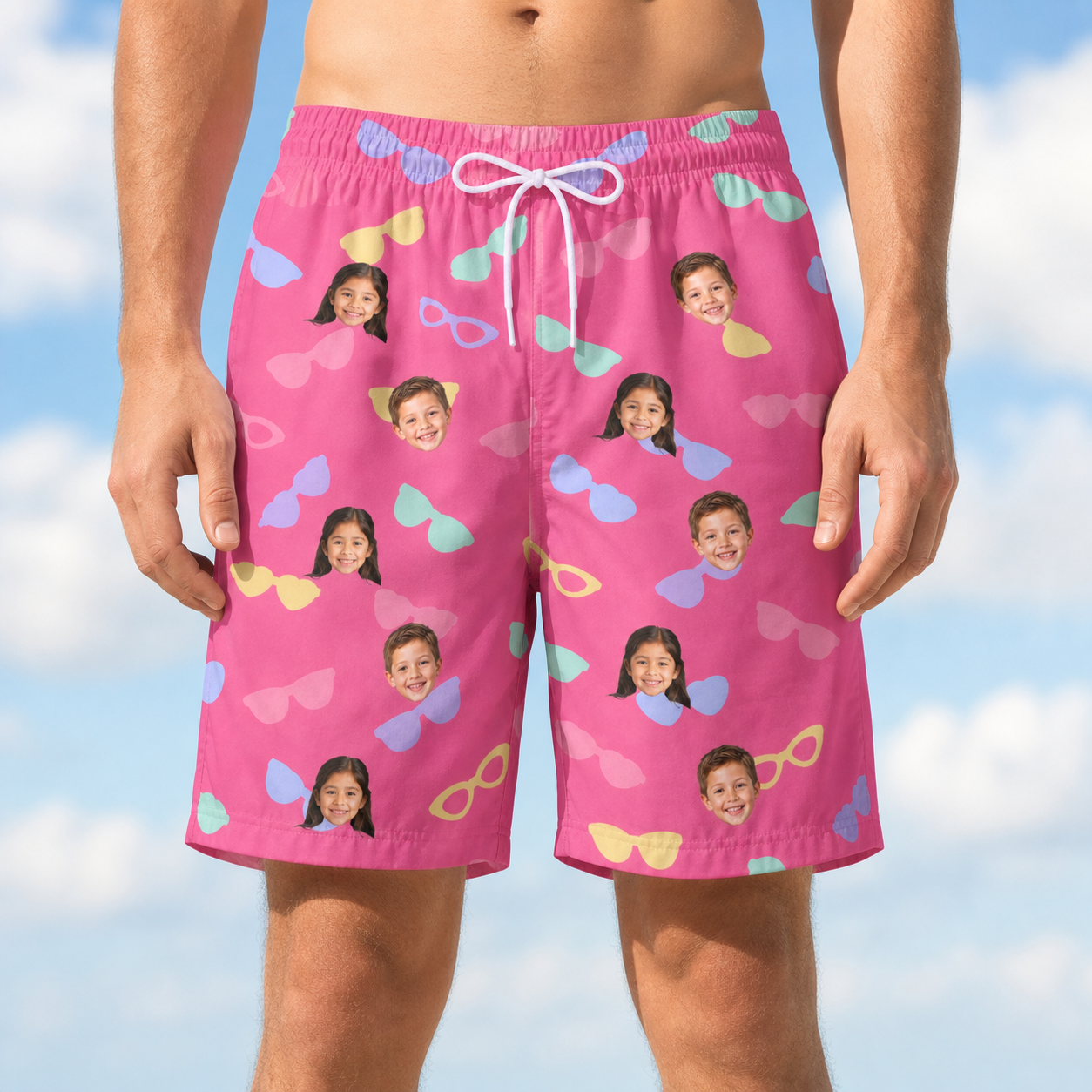 Model wearing Men's Sunbound Siblings Custom Face Beach Shorts printed with kids' faces