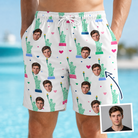 Man wearing Men's Lady Landmark Custom Face Beach Shorts — custom faces printed all-over