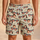 Model wearing Men's Indie Optics Custom Face Beach Shorts printed with kids' faces