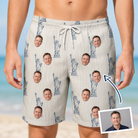 Man wearing Men's Harbor Halo Custom Face Beach Shorts — custom faces printed all-over