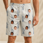 Model wearing Men's Harbor Halo Custom Face Beach Shorts printed with kids' faces