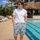 Real-life photo of someone wearing Men's Bunting Bonanza Custom Face Beach Shorts — custom faces printed all-over