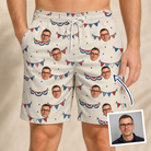 Man wearing Men's Americana Arc Custom Face Beach Shorts — custom faces printed all-over