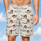 Model wearing Men's Americana Arc Custom Face Beach Shorts printed with kids' faces